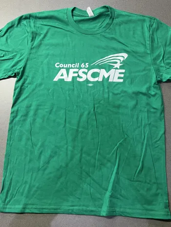 Picture of green t-shirt with white logo